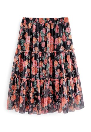 Jupe noire à volants avec taille élastique froncée, présentant un motif floral rose et orange et un tissu léger, légèrement transparent.