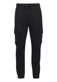 Zwarte sweatpants van katoenmix, met een elastische tailleband met trekkoord, zijcargo zakken en taps toelopende boorden.