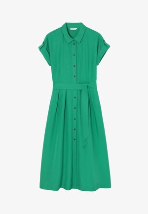 Zöld gombos ruhához, rövid, felgöngyölt ujjal, egy megkötős derékkal és pliszírozott szoknyával. Sima anyagból, barna gombokkal készült.