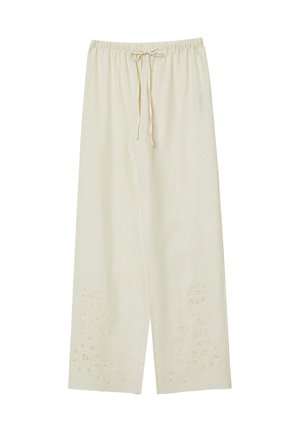 Pantaloni a gamba larga in morbido color crema, con cintura elastica e cordino, con ricami floreali sull'orlo. Tessuto leggero e traspirante.