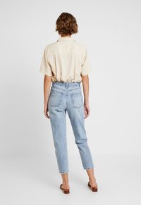 GAP Džíny Relaxed Fit - light-blue denim