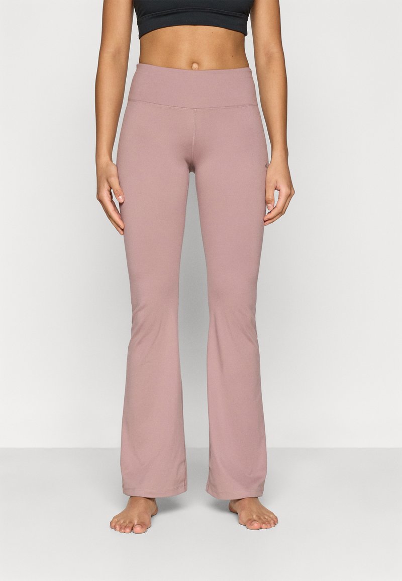 Pink flared pants with a high waistband, made of soft fabric. Features a smooth texture and a fitted silhouette down to the ankles.