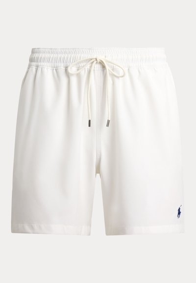 Λευκά μαγιό σορτς από απαλό, ελαφρύ ύφασμα. Διαθέτει ελαστική μέση με κορδόνι και μικρό ναυτικό λογότυπο.