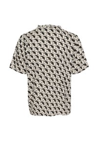 Blusa a maniche corte in tessuto crema con un motivo geometrico a cubi neri, con colletto arricciato e una silhouette ampia.