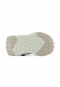 Shoe outsole featuring a textured gray rubber surface with circular dimples and a white midsole. Rounded heel area with contrasting accents.