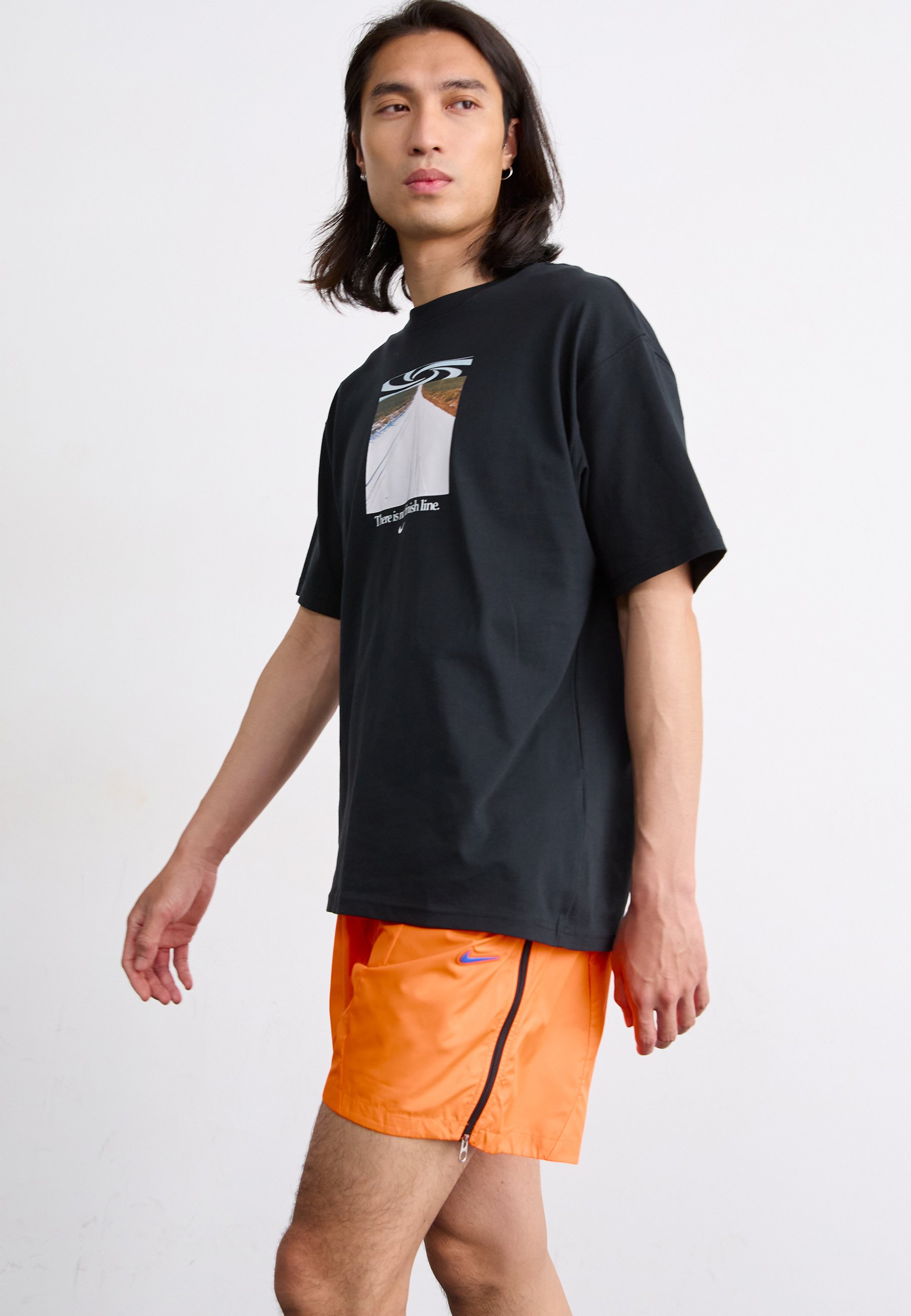 green red and yellow nike shorts