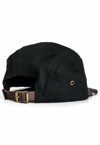 Black cap made of cotton, featuring a brown leather strap at the back, with a patterned brim and a ventilated grommet.