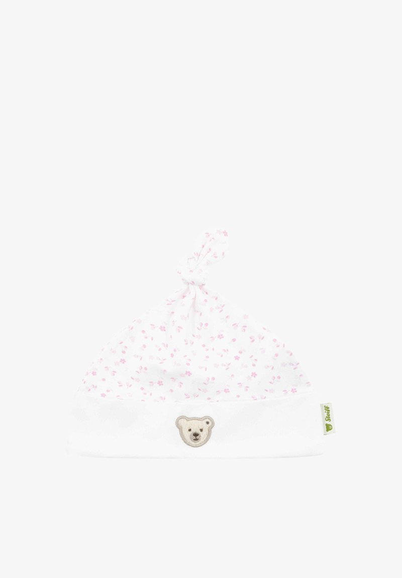 White cotton baby hat with pink floral pattern, knot at the top, and a bear face appliqué on the folded brim.
