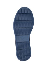 Semelle de chaussure noire avec un design texturé, présentant des motifs en vagues et une zone supérieure bleue solide étiquetée "High Soft" en gris.