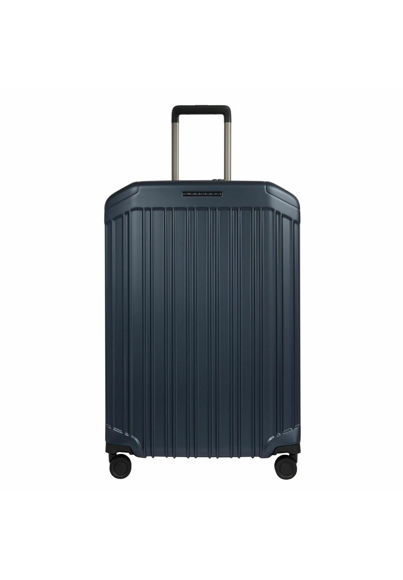 Marineblauer Hartschalenkoffer mit vertikalen Rillen, verlängerbarem Griff und schwarzen Rollen. Robustes Material, schlankes rechteckiges Design, kompakte Größe.