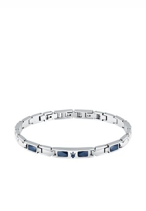 Silver-tone bracelet with rectangular links, featuring blue stones and a central emblem. Smooth texture with polished finish.