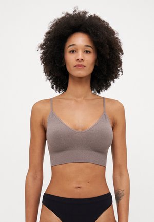 ONLVICKY GLITTER SEAMLESS - Bustier - beige/silver