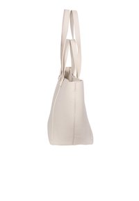 Light beige leather tote bag with a textured finish, two shoulder straps, and a tapered shape. Side seams feature subtle stitching details.