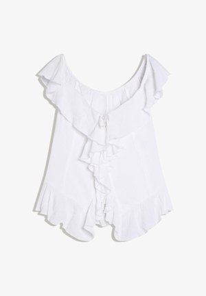 Blouse blanche sans manches avec encolure bardée de volants dénudée aux épaules et détails de volants en cascade sur le devant et à l'ourlet.