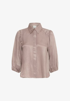 Blouse en satin de couleur taupe doux avec un col, des manches bouffantes longues avec des poignets élastiques et un devant à boutons. Texture lisse.