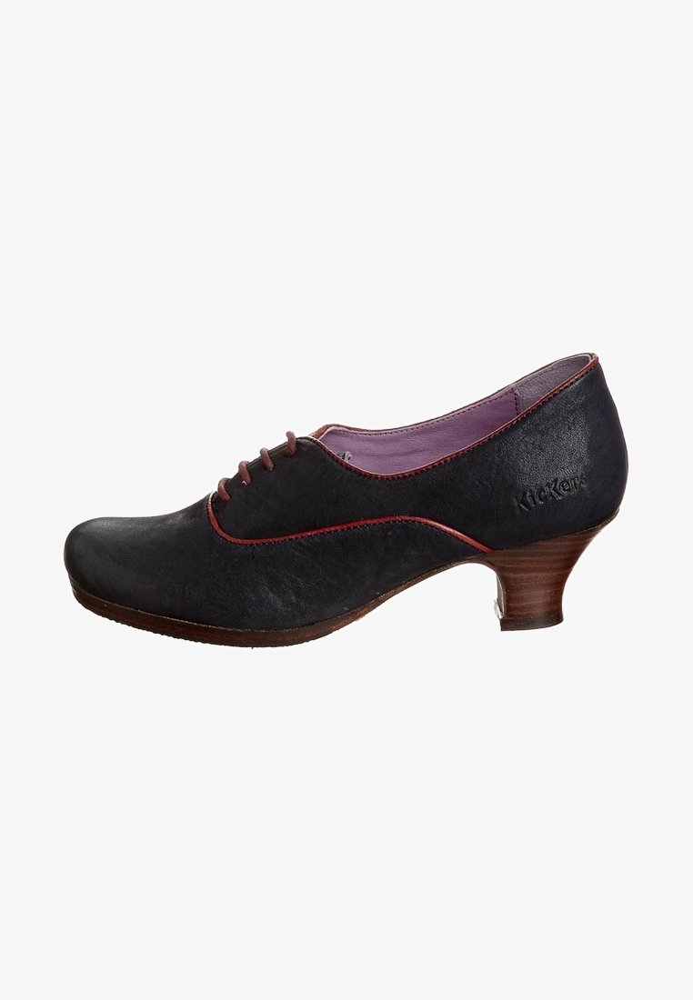 Black leather shoe with a rounded toe, red trim along the side, four lace holes, and a medium-height wooden heel. Lined in purple fabric.