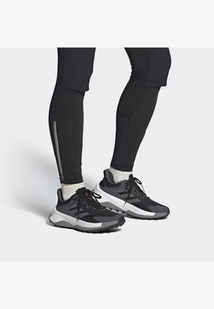 Adidas Terrex SOULSTRIDE ULTRA - Laufschuh Trail - core black/grey four/impact orange