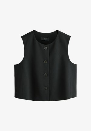 Mustast värvi varrukateta vest ümarate kaelusega ja viie ees oleva nupuga. Valmistatud siledast kangast, istuv lõige ja nähtamatud taskud.
