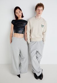 Jaded London TRIBAL AIRBRUSH STAR JOGGER UNISEX - Træningsbukser - grey tribal