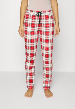 Pantaloni da pigiama a quadri rossi e bianchi con elastico in vita e lacci. Design a gamba dritta realizzato in un materiale morbido e leggero.