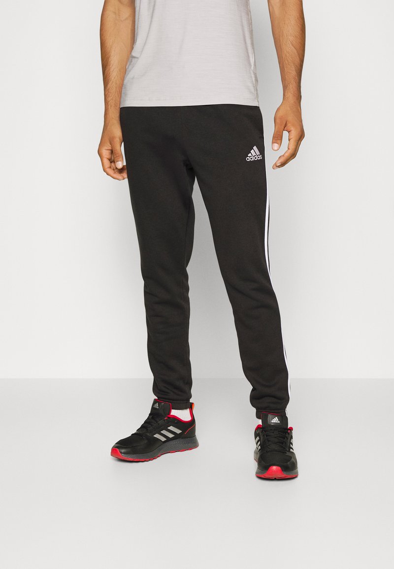 adidas Sportswear ESSENTIALS TAPERED CUFF Tracksuit bottoms black