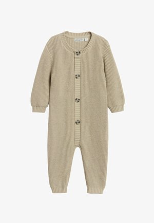 Beżowy dzianinowy kombinezon z okrągłym dekoltem, długimi rękawami i zapięciem na guziki z przodu, z prążkowanymi mankietami i fakturowaną tkaniną.