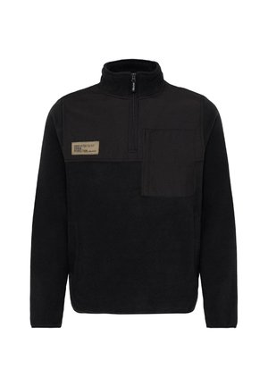 Svart fleece-pullover med høy krage, halv-zip front og brystlomme. Har et stoffpatch med preget tekst. Myk tekstur.