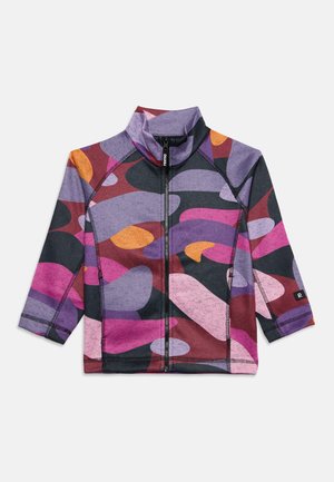Børnejakke med lange ærmer og lynlås med farverige abstrakte former i lilla, pink, orange og sort på hvid baggrund.