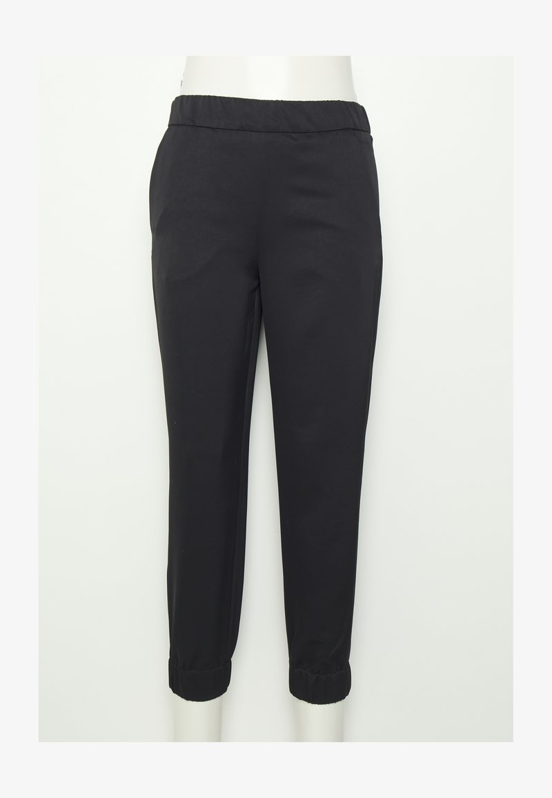 Calças pretas ajustadas com cintura elástica e punhos franzidos. Feitas de um tecido suave, apresentam um design simples, sem padrões nem adornos.