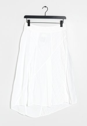 White skirt with a flowing, lightweight design. Features a high-low hem, textured fabric with diagonal and diamond patterns.