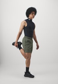 Under Armour MOCK - Top - black/white