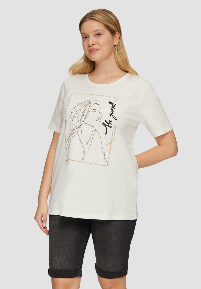 Weißes Baumwoll-T-Shirt mit rundem Halsausschnitt, das eine minimalistische Linienzeichnung eines Gesichts und den Text "Sei du selbst" in schwarzer Schreibschrift zeigt.