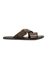 Brown leather slide sandal with a wide strap, fabric detailing, and a gold buckle accent. Flat sole with a textured footbed.