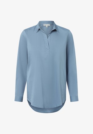 Light blue long-sleeve blouse with a pointed collar, V-neckline, and a curved hem. Made of smooth fabric with a relaxed fit.