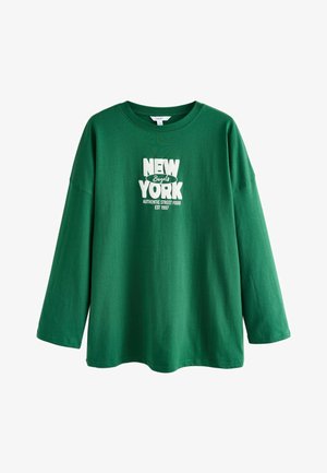 Green long-sleeve t-shirt made of cotton. Features a white graphic print stating "NEW YORK Bagels AUTHENTIC STREET FOOD EST 1997."