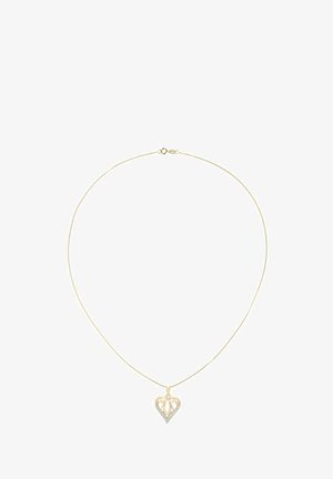 Kullatooni kaelakee südamekujulise ripatsiga, millel on lõigatud disain ja alumise ääre ääres sisse seatud selged kivikesed.