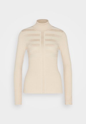 Hellbeige Rollkragenpullover mit langen Ärmeln, der ein horizontales Streifenmuster und eine gerippte Textur aufweist. Hergestellt aus einem weichen Strickmaterial.