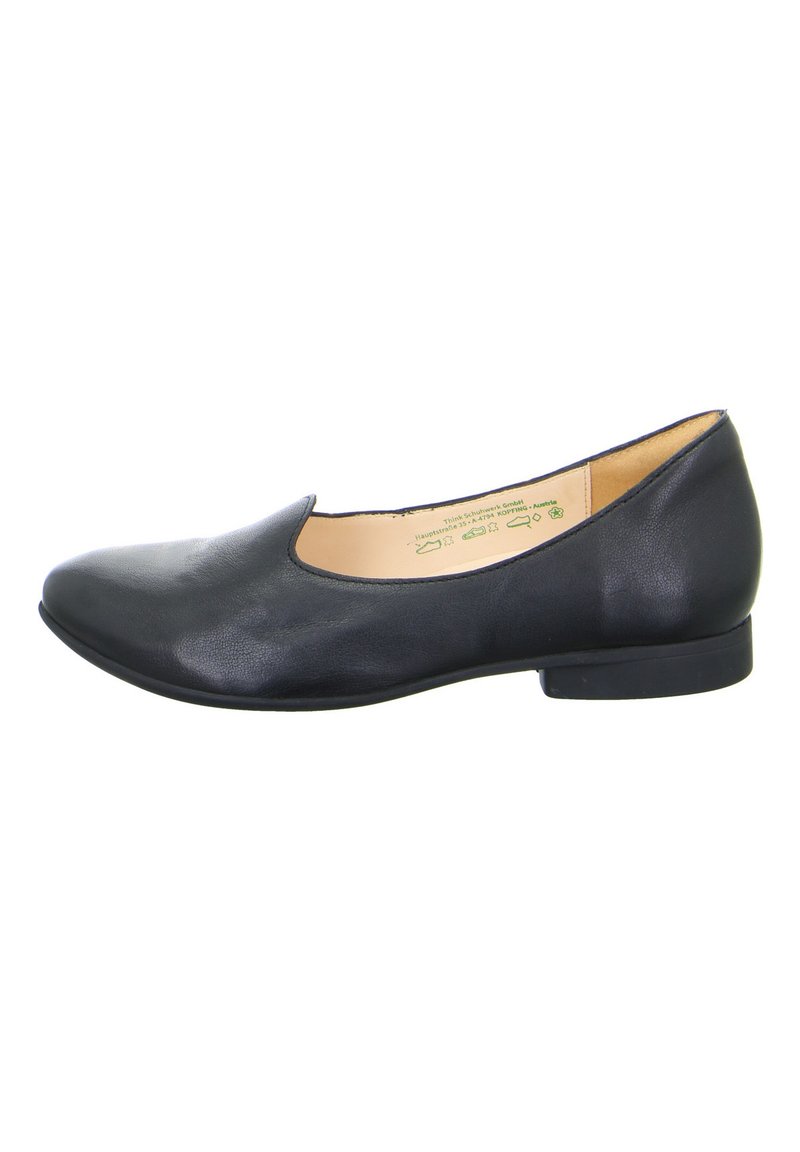 Ballerine in pelle nera con punta arrotondata, cuciture minime, tacco basso e texture liscia. Fodera interna beige.