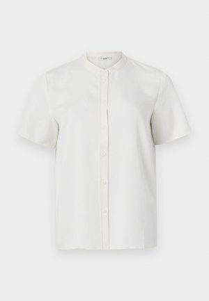Short-sleeve white button-up shirt with a stand collar, smooth texture, and front buttons, featuring a simple, clean design.