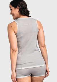 Grey tank top and shorts set made from lightweight fabric, featuring a subtle sheen, contrasting trim, and a discreet logo on the back.