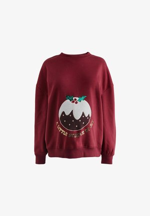 Hanorac vin roșu cu un design de budincă festivă, având glazură albă, vârfuri de holly verzi și accente roșii, cu textul "Un Mic Pachet de Bucurie".