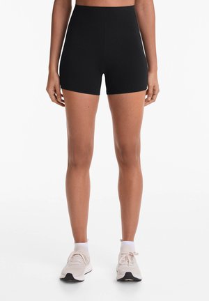 COMPRESSIVE CORE CONTROL 10cm HOT PANTS - Leggings - black