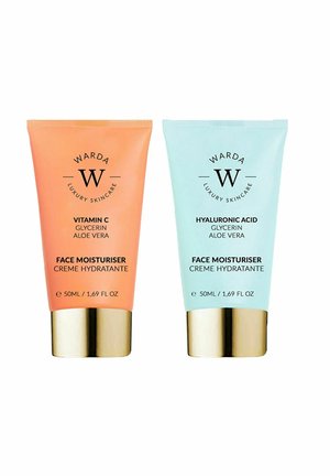 Dwa luksusowe kremy nawilżające do twarzy Warda, po 50 ml każdy, z witaminą C lub kwasem hialuronowym, gliceryną i aloesem, w pomarańczowych i jasnoniebieskich tubkach.