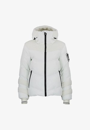 Doudoune blanche avec capuche, présentant une partie supérieure en polaire douce, une fermeture éclair noire et des poignets côtelés avec un logo de marque.