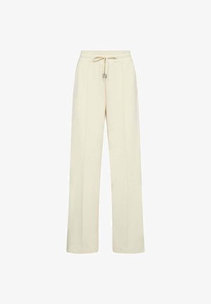 Cream wide-leg sweatpants with an elastic waistband and a drawstring tie at the front.