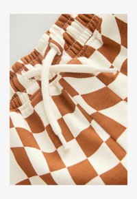 Niewybrane, rust brown check