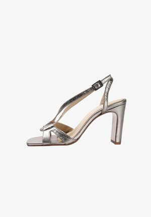 Metallisch silberne High-Heelsandalen mit quadratischer Zehe, verstellbarem Riemen und strukturiertem Finish. Sie verfügen über einen stabilen Blockabsatz.