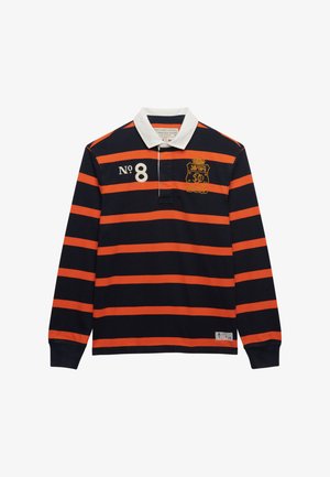 Mørkeblå rugbytrøje med vandrette orange striber, hvid krave, nummer 8 på venstre bryst og broderet skjold på højre bryst.