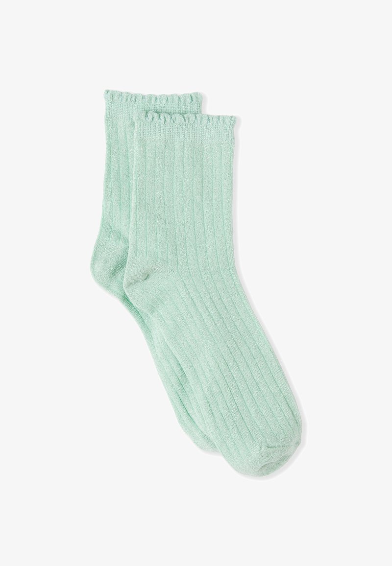 Hellgrüne gerippte Socken mit weicher Textur und gerafftem oberen Rand. Hergestellt aus einem Mischgewebe für Komfort und Flexibilität.