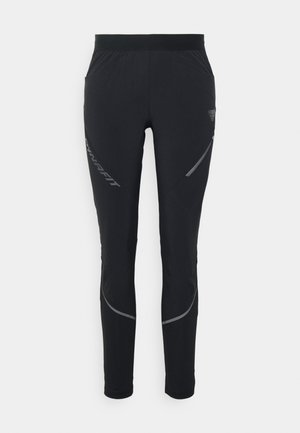 Black athletic pants with a tapered fit, made from a stretchy material. Features side pockets and reflective accents for visibility.